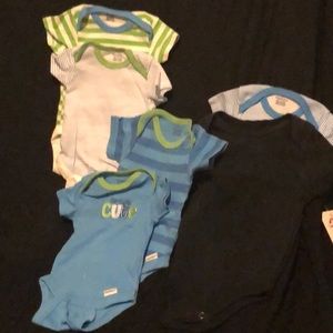 Six baby boy onesies